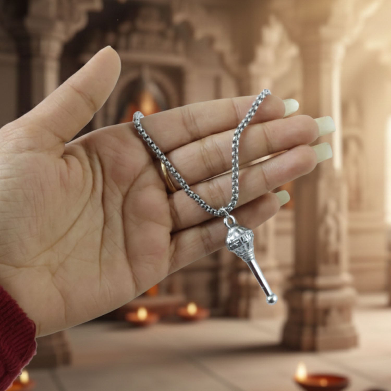 A person wearing the elegant Hanuman Gada Pendant, showcasing its daily wear appeal.