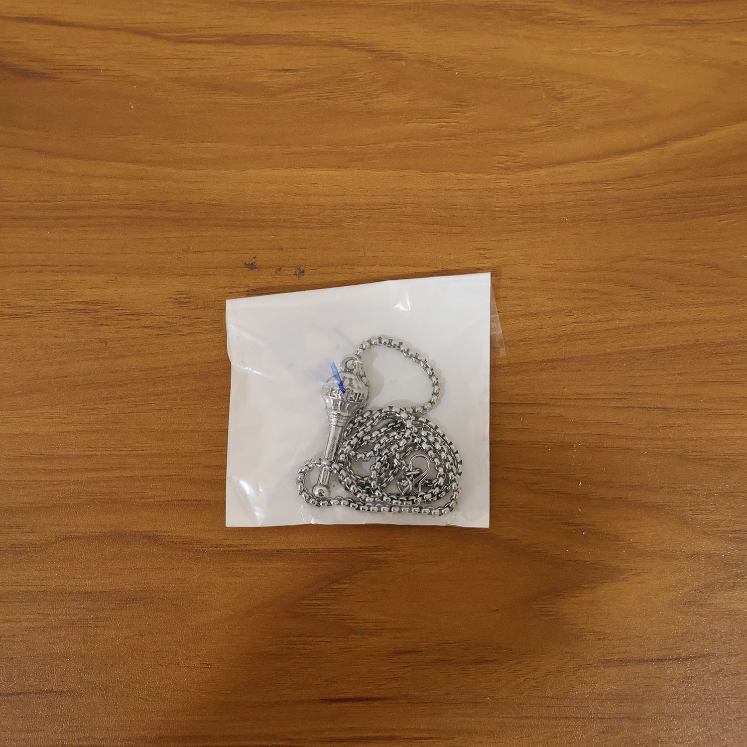 Live shot of the Hanuman Gada Pendant worn, showing its size and divine appeal.