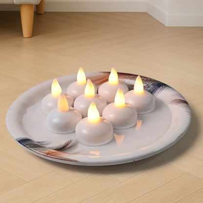 Battery operated round LED flameless tealight candles with warm white glow
