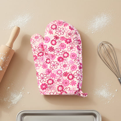 Stylish oven mitt and pot holder set featuring a colourful print.