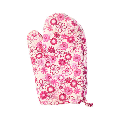 The elegant oven mitt and pot holder set displayed in a modern kitchen setting.