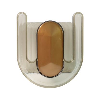Mounted slipper stand holding a pair of slippers on the wall