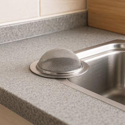 Supermom stainless steel kitchen sink strainer on white surface