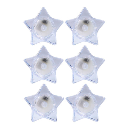 Battery operated LED candles in star-shaped holders for safe lighting