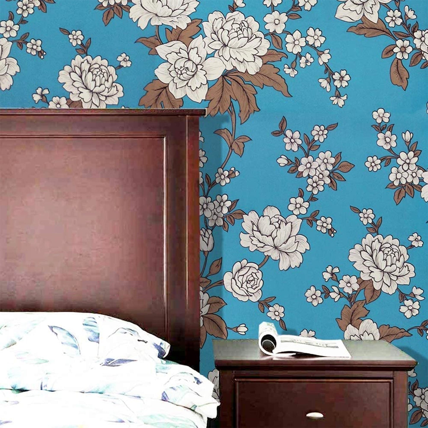 Wallpaper roll being applied with easy peel-and-stick adhesive
