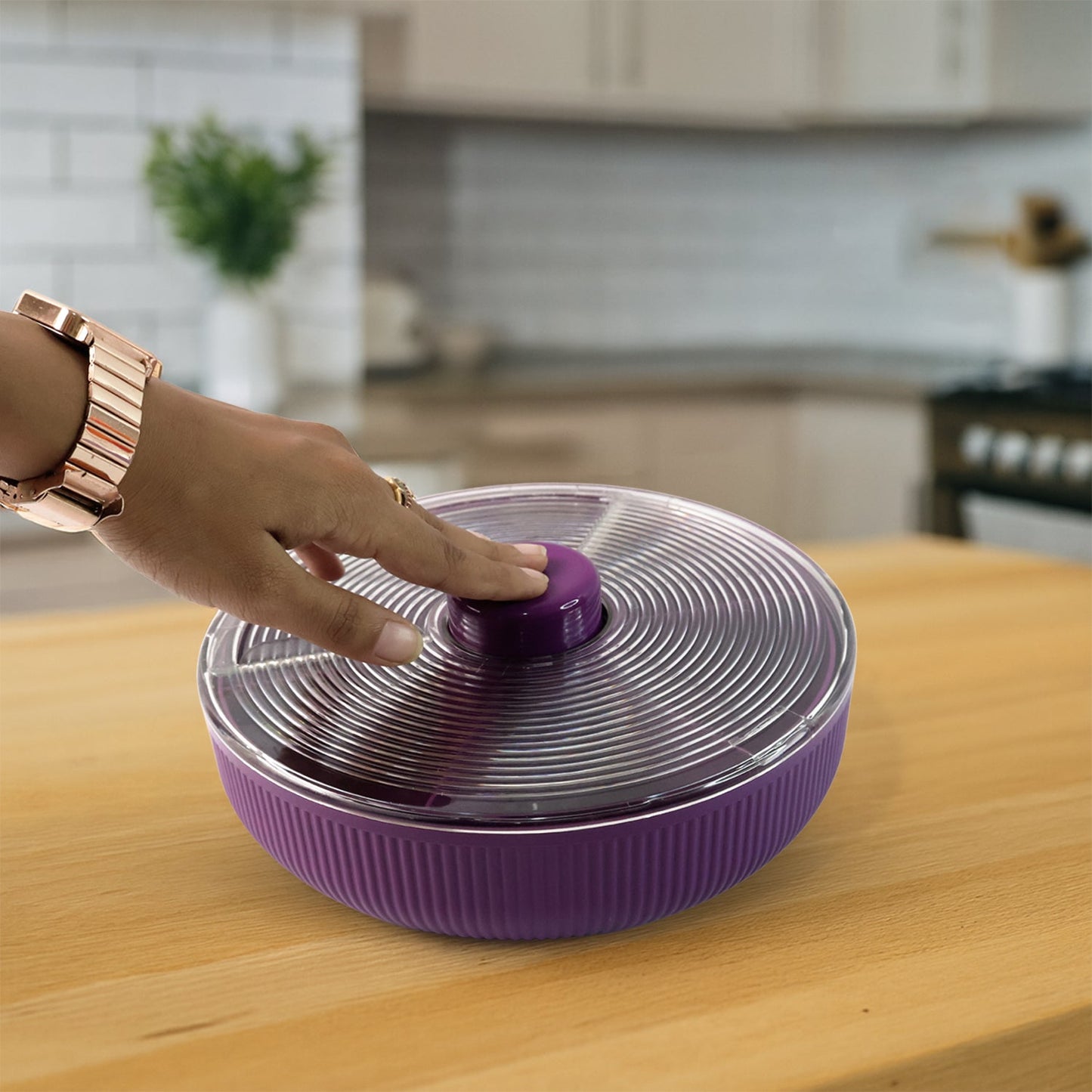 Detailed view of rotating snack container compartments and lid