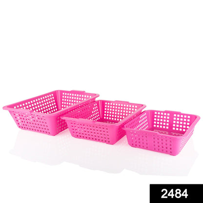 Multiple size plastic fruit baskets, styled to organize fresh produce.