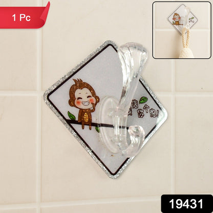 Close-up of transparent cartoon design wall hook with adhesive back