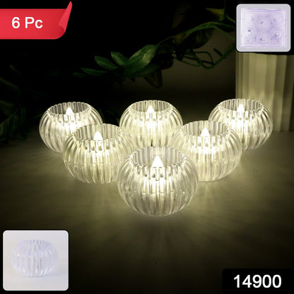 Close-up of crystal design LED flameless tealight candle glowing warmly