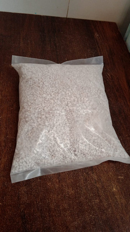 Lightweight Indo Glow Perlite used as a soil conditioner for plants.