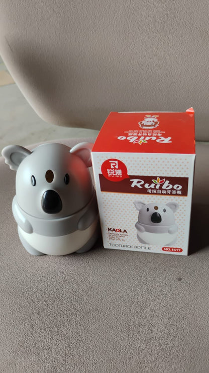 Vertical image of koala toothpick holder dispenser on kitchen counter