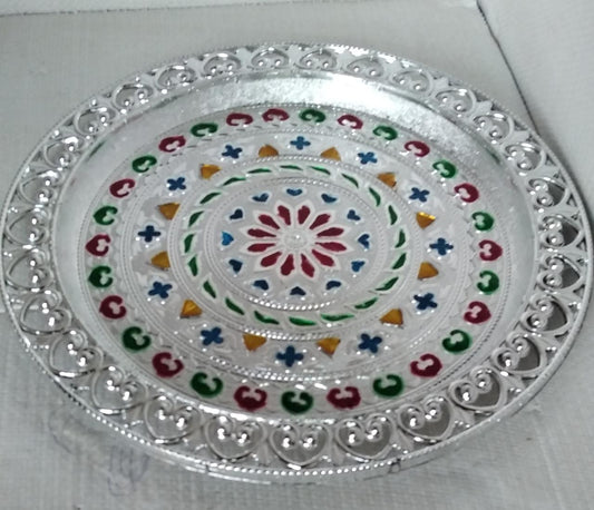 Elegant silver plated pooja thali, perfect for Indian traditional worship and ceremonies.