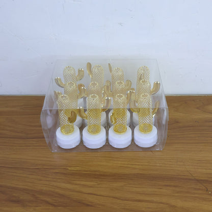 Decorative cactus shaped flameless LED candles lit up adding ambient lighting