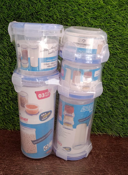 An organised display of multiple round airtight food storage containers on a kitchen shelf.