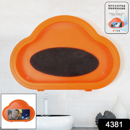 Hand interacting with a smartphone inside the orange waterproof mobile stand, demonstrating touch functionality.