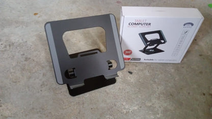 Compact size of the rotating laptop stand when folded, ideal for travel.