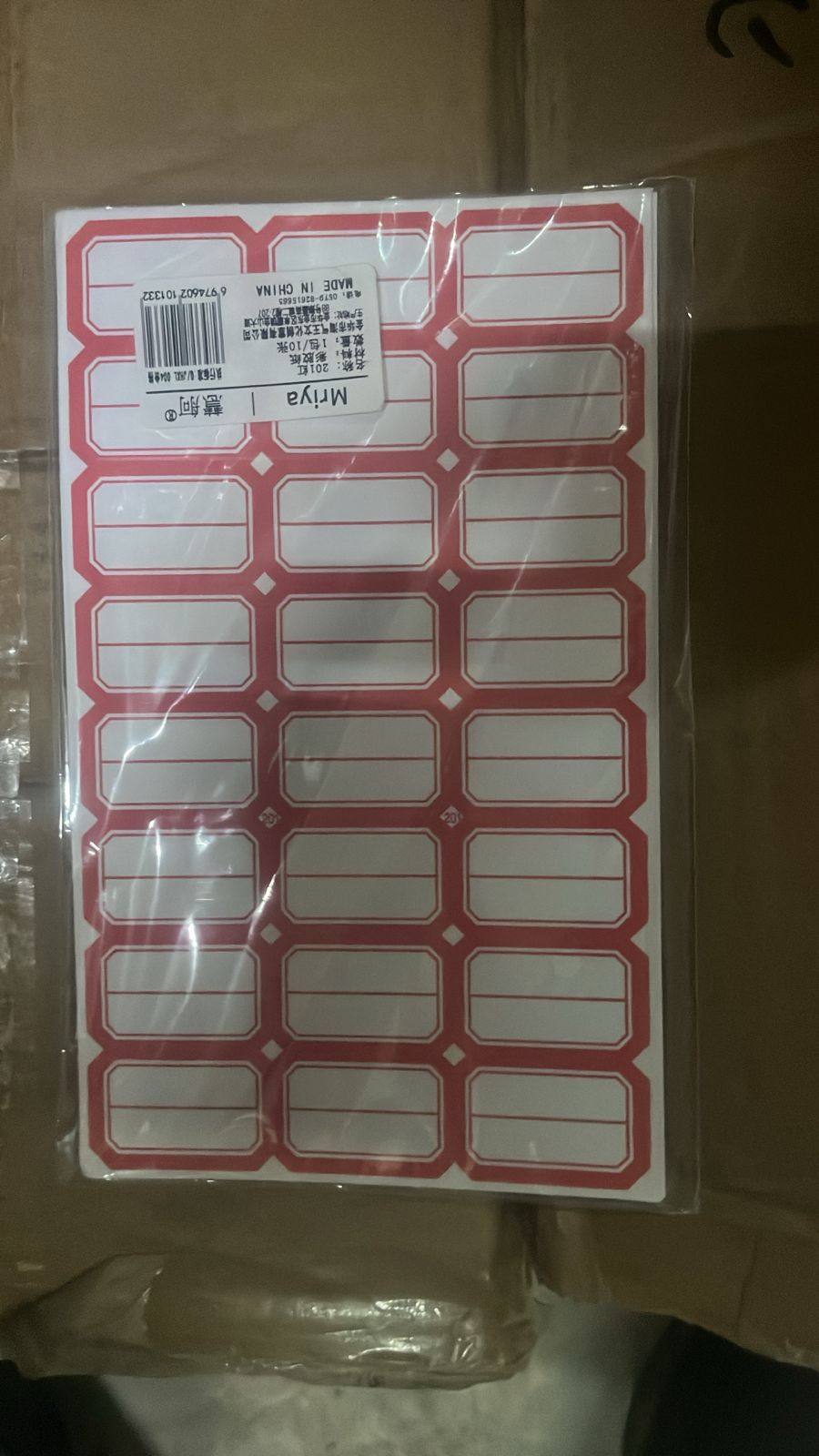 Close-up of blank label sheets designed for easy writing and sticking