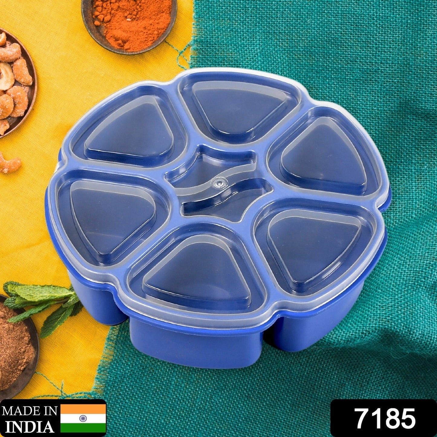 Close-up of the transparent lid sealing the 7-section spice box.