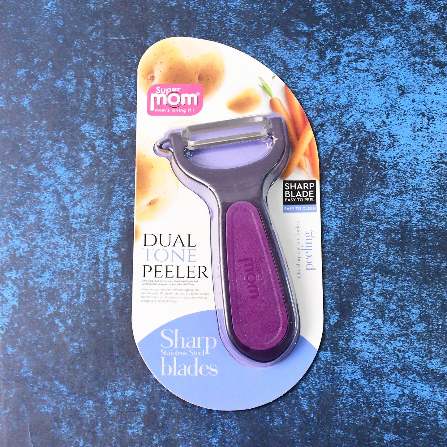 Vegetable peeler in kitchen setup, showcasing ultra sharp blade and stylish handle
