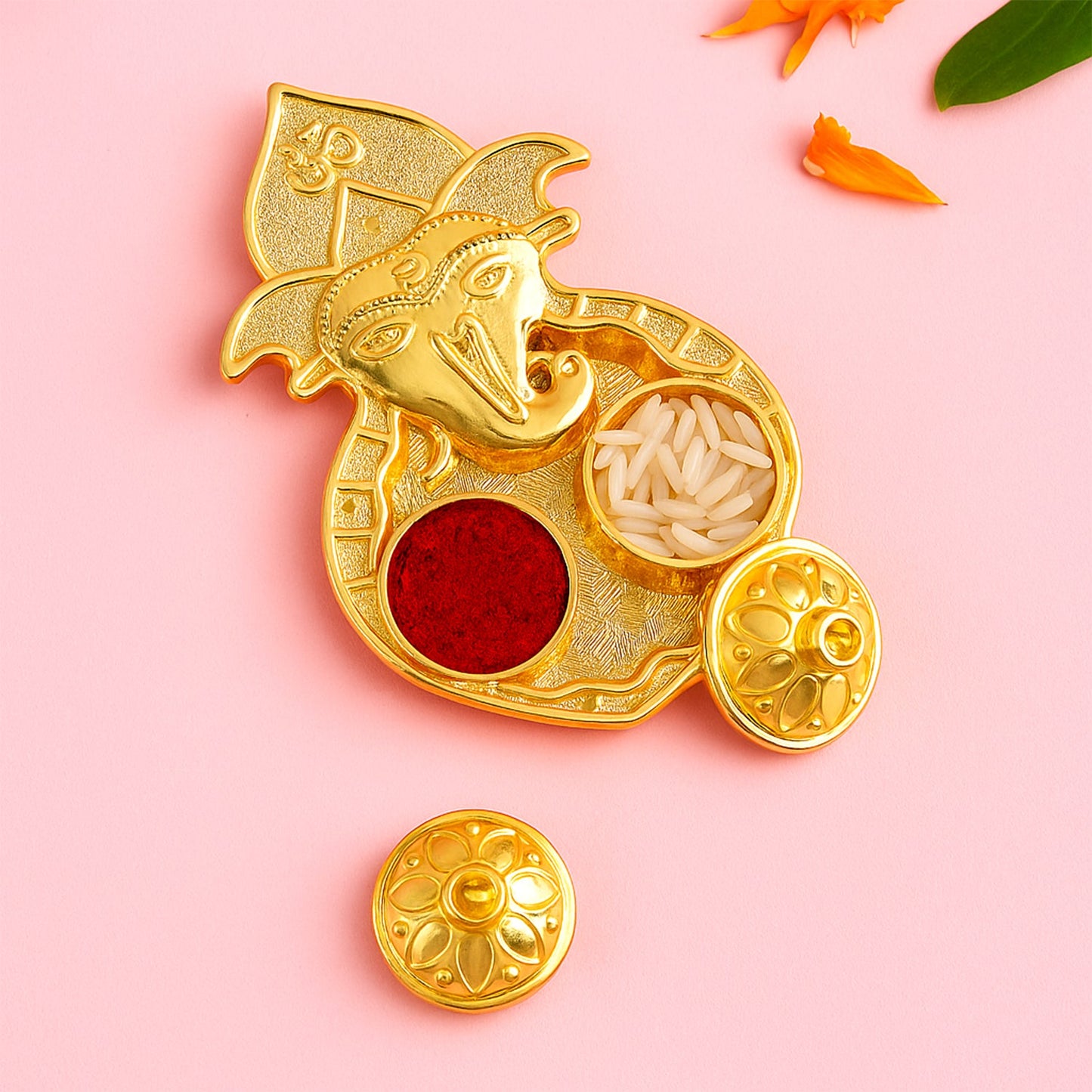 Golden decorative kumkum dish for holding roli, chandan, and haldi powders