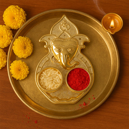 Traditional plastic kumkum dish with detailed Lord Ganesha embossing
