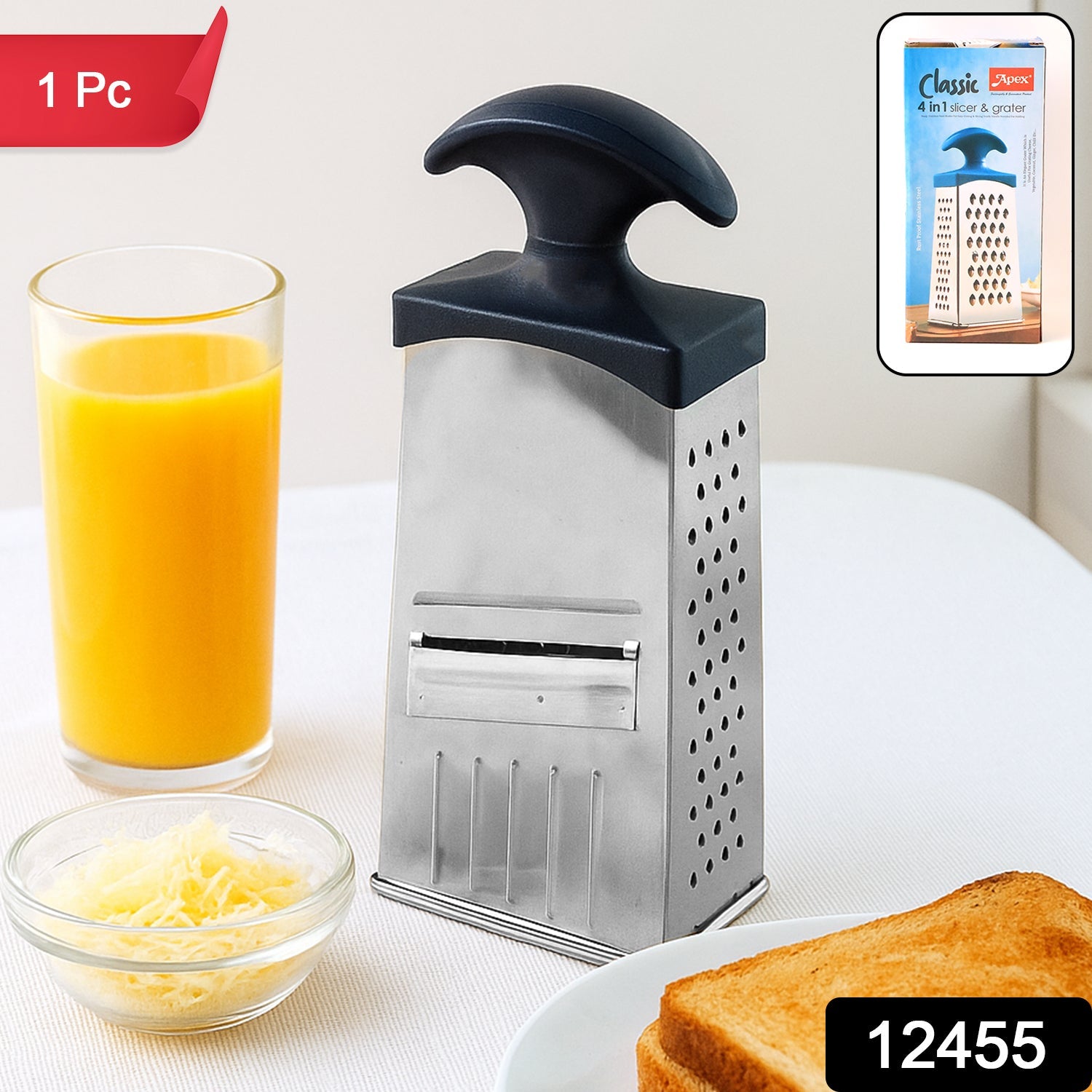 Stainless steel multipurpose grater and slicer showing sharp blades with handle