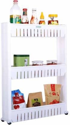 The slim storage rack displayed empty, highlighting its three spacious tiers.